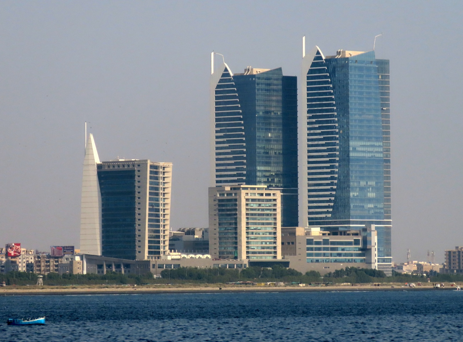 Karachi skyline featuring Dolmen Towers near the Arabian Sea — the commercial heart of Pakistan.